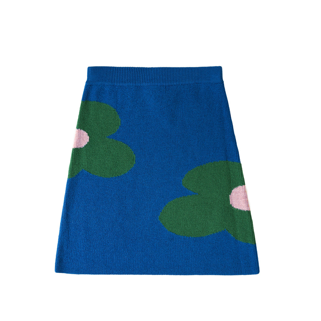 Blue skirt with green floral patterns on a white background