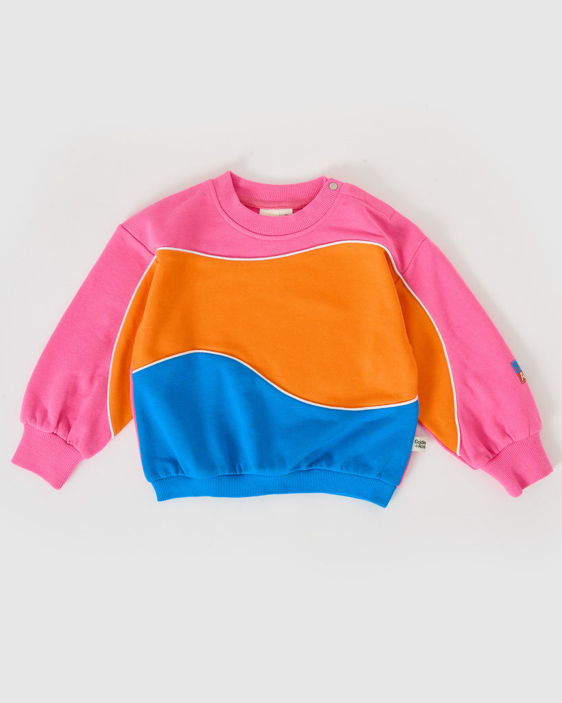 Color-blocked pink, orange, and blue sweatshirt on a white background