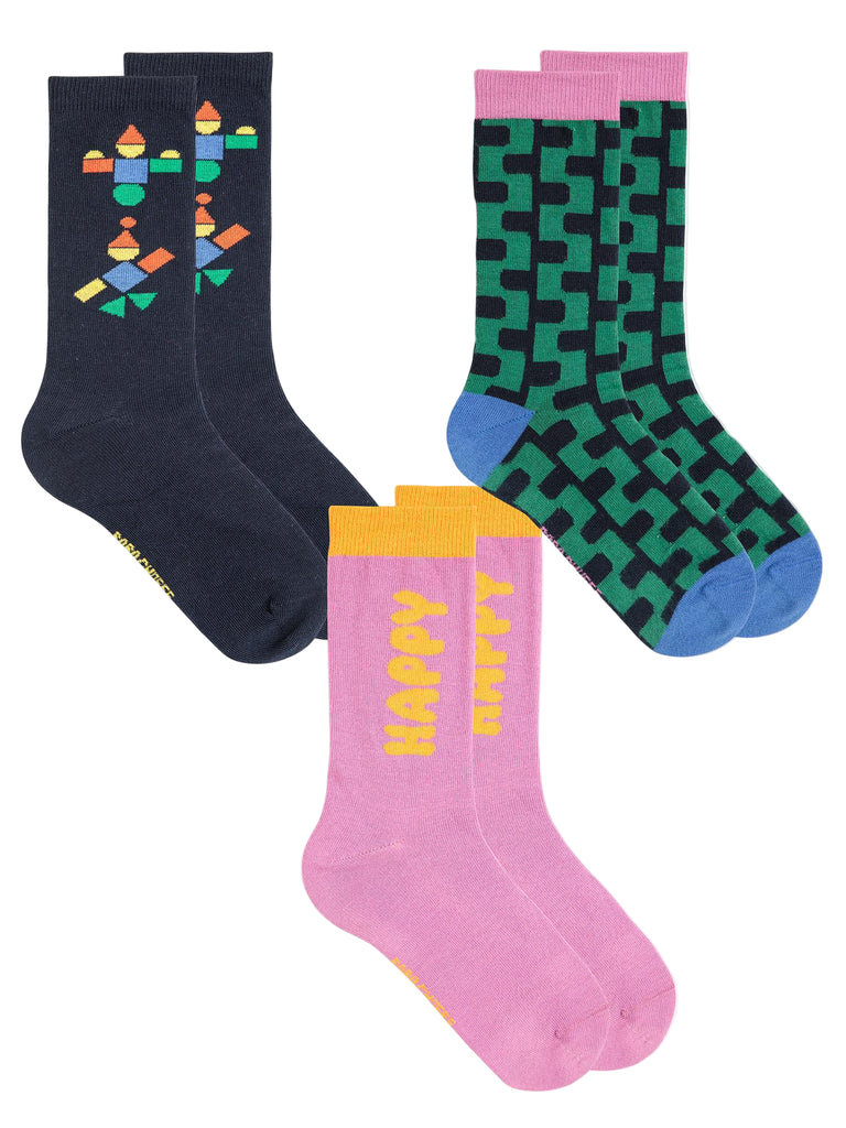 Three pairs of colorful socks on a white background