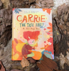 "Carrie the Tree Fairy" book displayed on woodland background