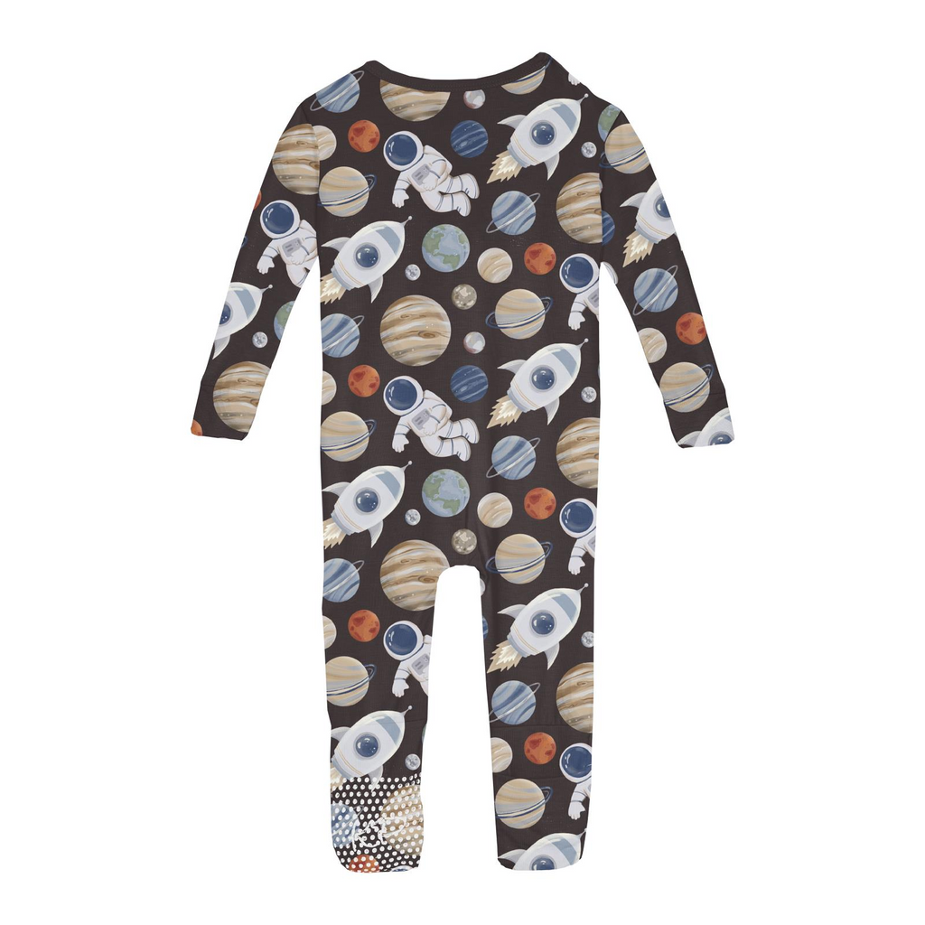 Children's onesie with space-themed print on a white background