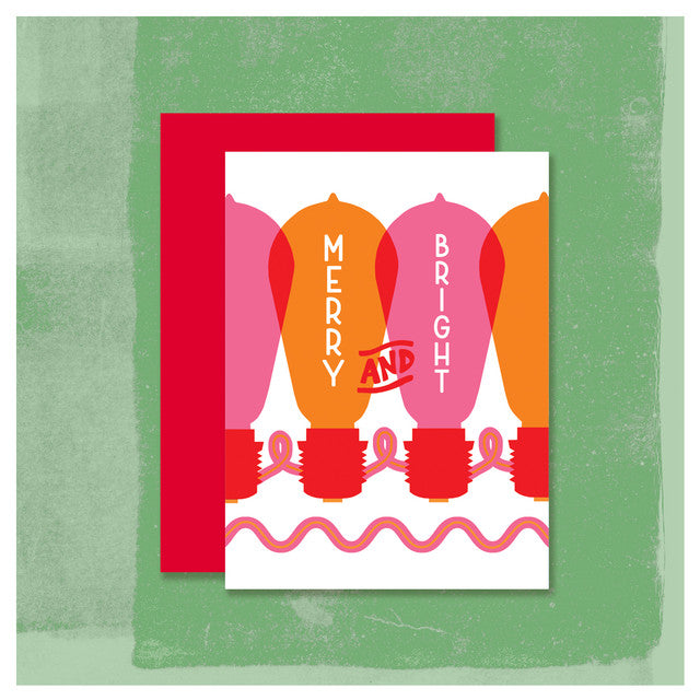 Holiday card with colorful light bulb design on a green background