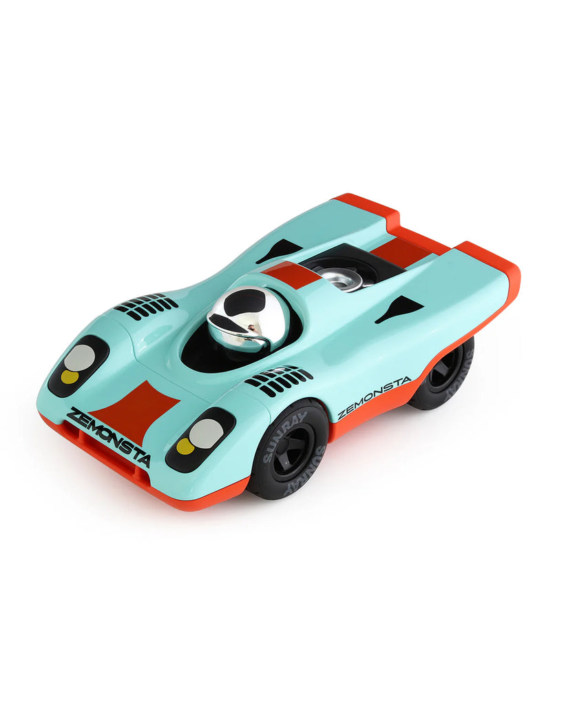 Toy race car with a light blue body and red accents on a white background